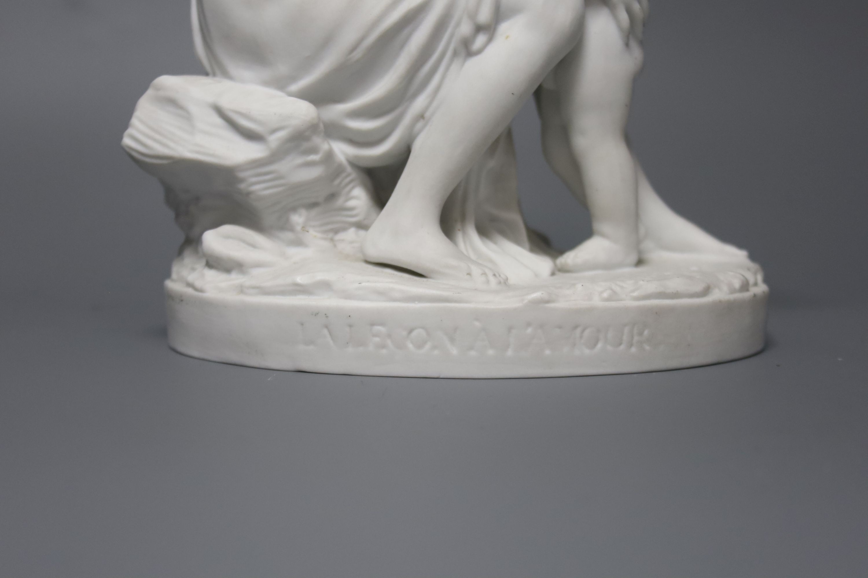 A Sevres biscuit porcelain group, ‘La Lecon a L’ Amour ’, 21cm high.
